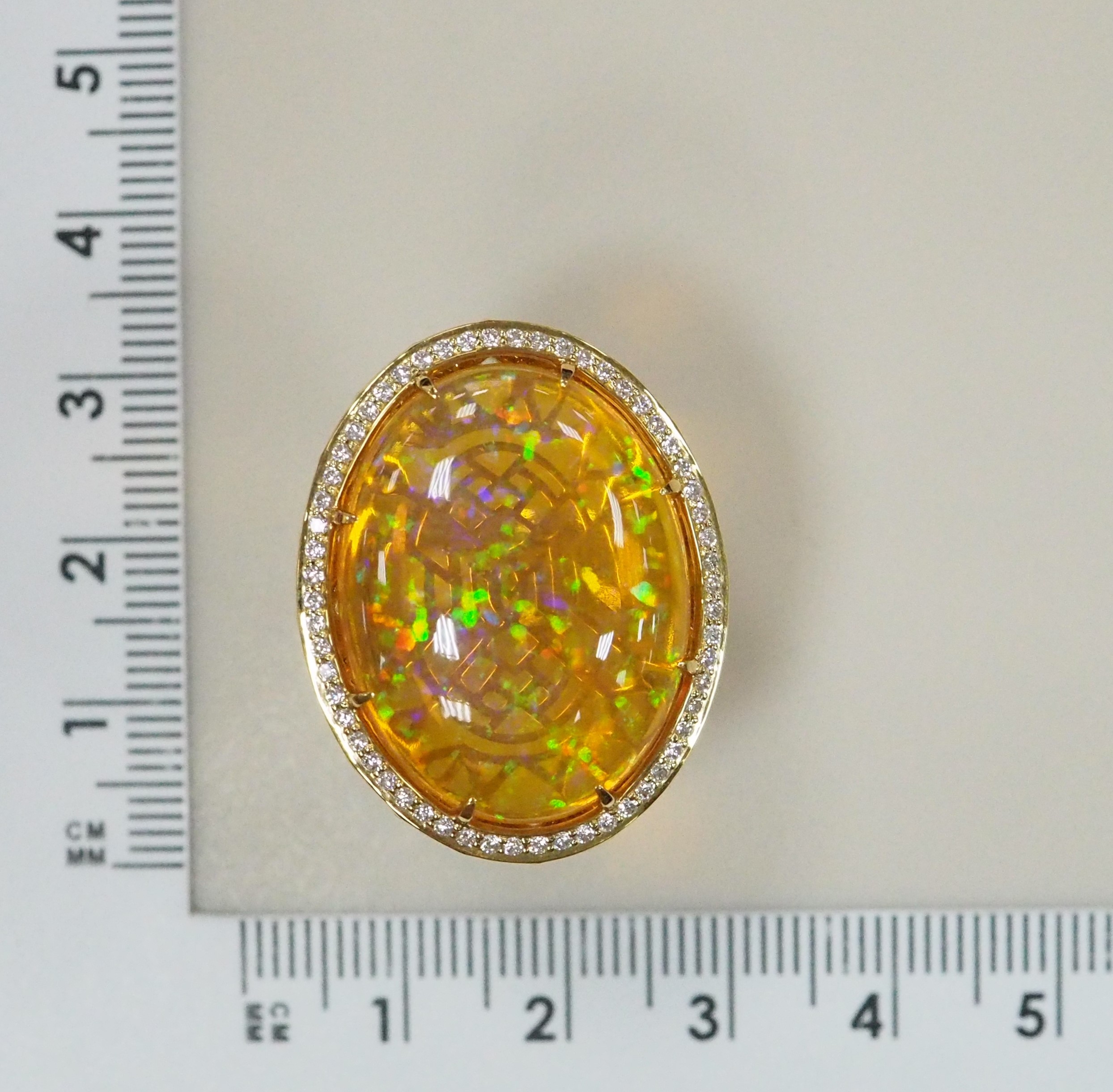 Кольцо из желтого золота с опалом